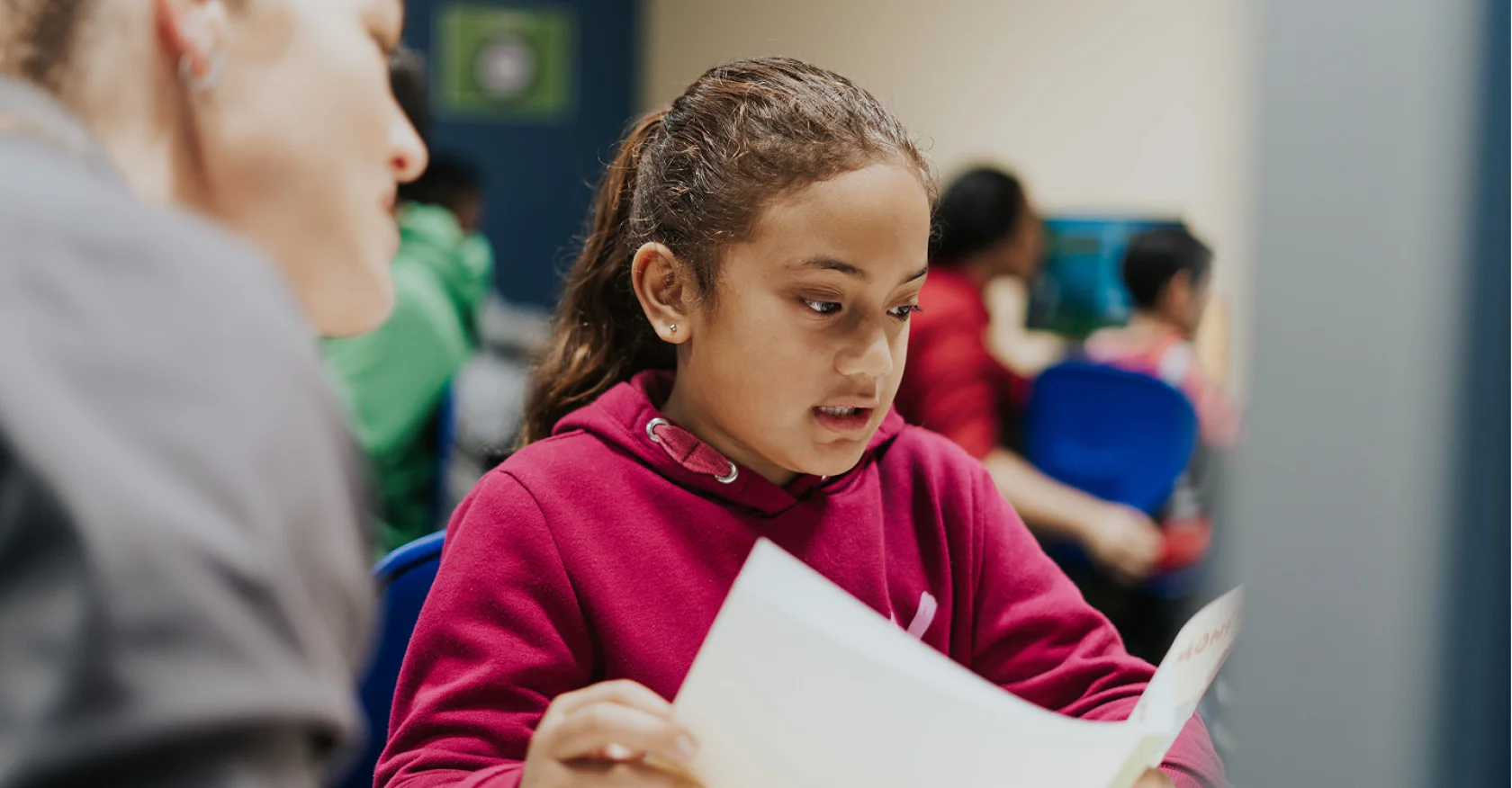 Child reading at school